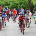 Volunteers held back a crowd of children who brought up the rear of the parade on bikes and roller blades. Ben Freed I AnnArbor.com